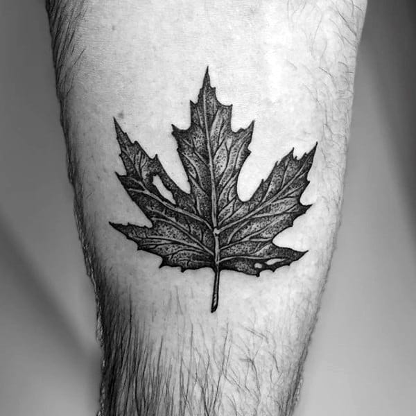 Guys Thigh Tattoo Of Maple Leaf