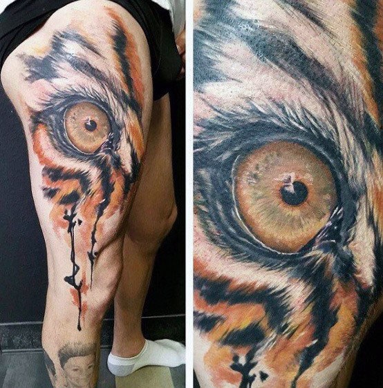 Guys Tiger Eyes Tattoos On Leg And Thigh
