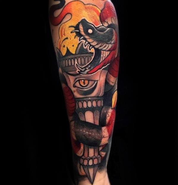 Dark torch tattoo with a coiled black snake, fiery background, and an ominous eye at the center of the torch handle.