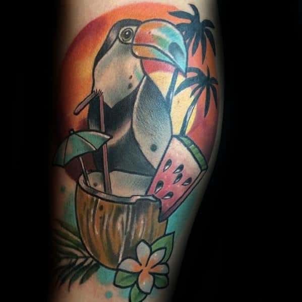 Playful toucan tattoo with a coconut drink, watermelon slice, palm trees, and sunset background for a tropical vacation vibe.