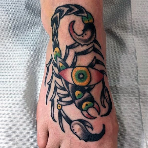 Guys Traditional Scorpion Eye Tattoo Design On Foot