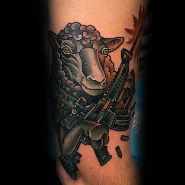 Colorful tattoo of a tactical sheep holding an AR-15, wearing a bandolier, and firing rounds, symbolizing strength, defiance, and unexpected resilience.