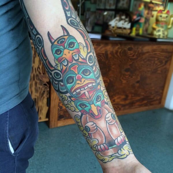 Guys Traditional Totem Pole Forearm Half Sleeve Tattoo