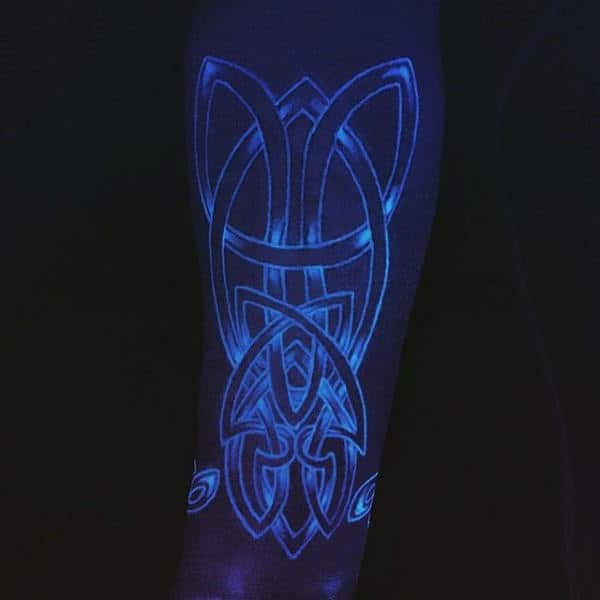 Guys Tribal Tattoo Under Black Light With Glow In The Dark Ink