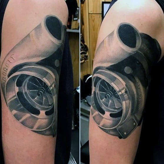 Realistic turbocharger tattoo on the upper arm with intricate shading and fine details, symbolizing speed, power, and a passion for automotive engineering.