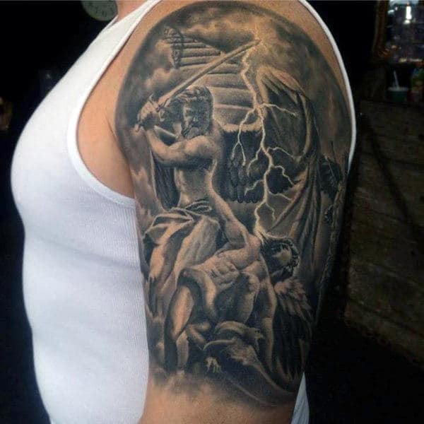 Guys Upper Arms Black And Grey Killing Evil Tattoo