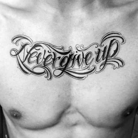 Guys Upper Chest Never Give Up Tattoo Design Ideas