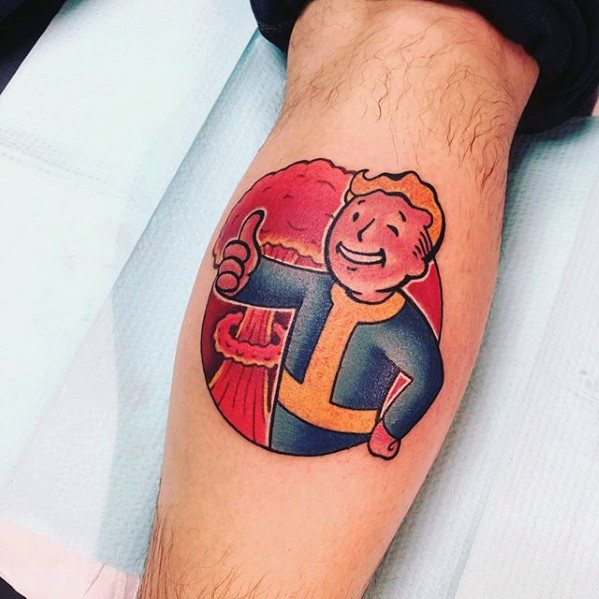 Vault Boy tattoo in a red circle with a thumbs-up, backed by a fiery mushroom cloud for a bold post-apocalyptic Fallout vibe.