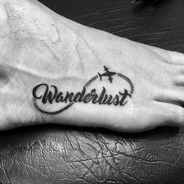 Guys Wanderlust Flying Plane Foot Tattoo