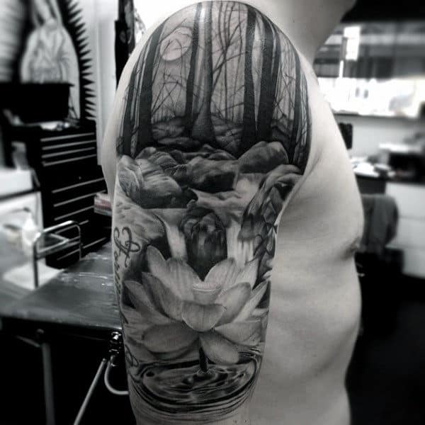 Guys Water Flower Tattoo Lilly In Black Ink On Upper Arm