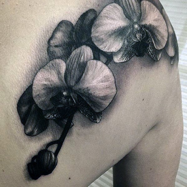 Guys White And Black Shaded Orchid Back Of Shoulder Tattoos