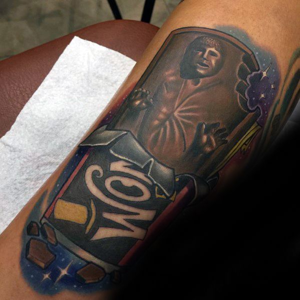 Unique Willy Wonka tattoo showing a Wonka Bar with a figure encased inside the chocolate, blending fantasy and sci-fi elements.