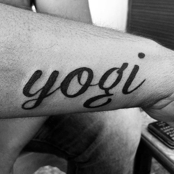 Guys Yogi Black Ink Letters Outer Forearm Name Tattoo
