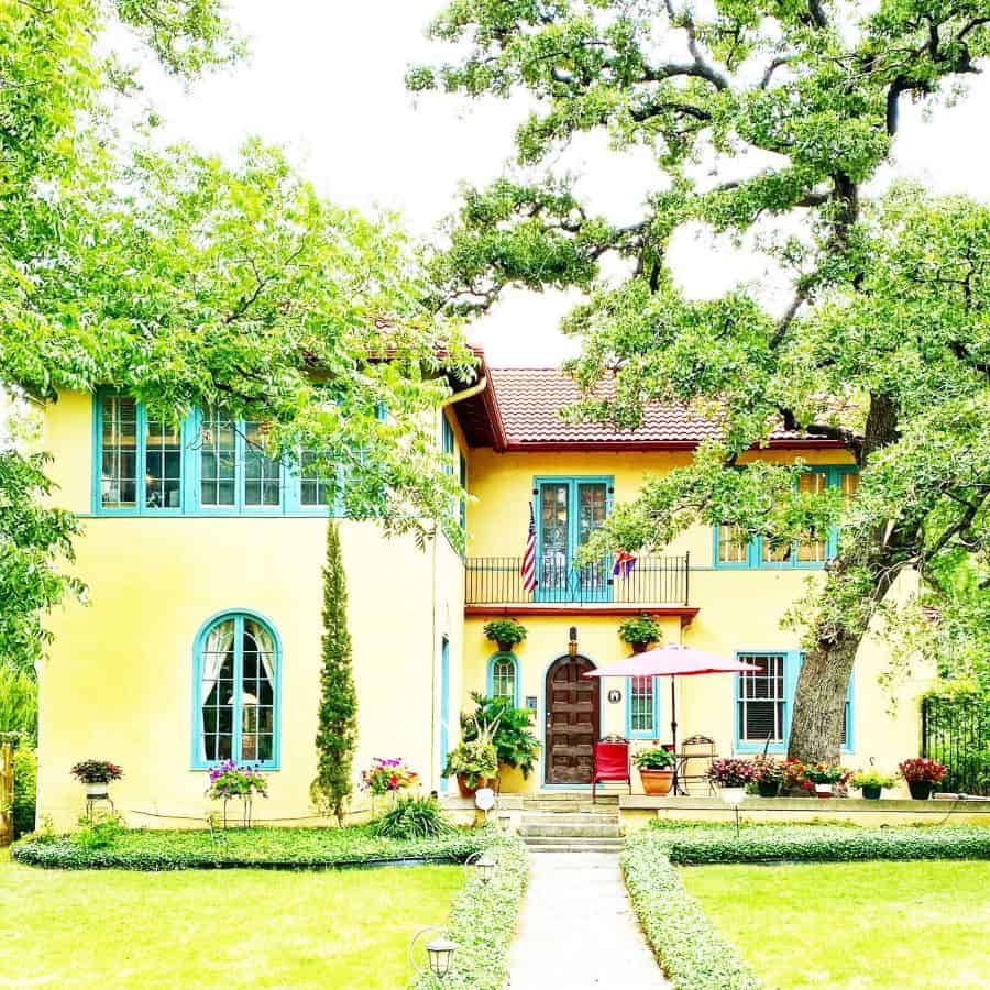 yellow hacienda spanish-style home 