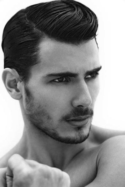 Sleek, vintage pompadour with a defined side part