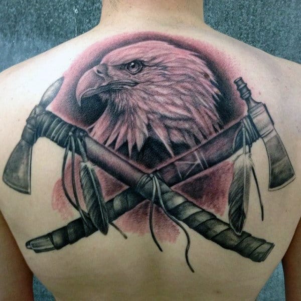 Half Back Mens Tattoo Of Native American Tomahawks With Bald Eagle Design