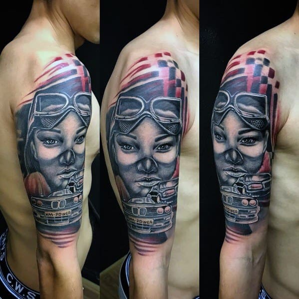 Detailed BMW-themed tattoo sleeve, featuring a woman in racing goggles, an E30 M3, and checkered flag elements for a bold motorsport design.
