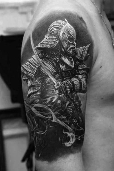 Black and grey tattoo of a fierce samurai with drawn sword, symbolizing honor, discipline, courage, and the warrior’s unwavering spirit.