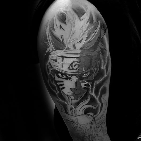 Black and white Naruto tattoo on a person's upper arm