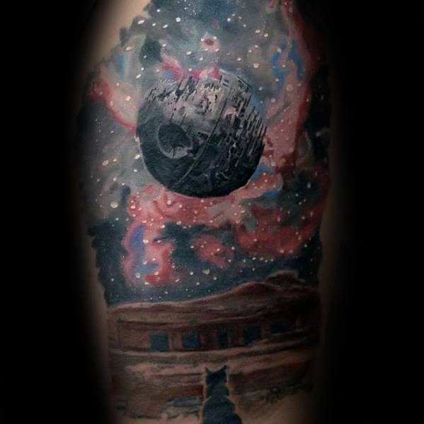 Tattoo of the Death Star floating in a colorful cosmic sky with a silhouetted figure gazing up