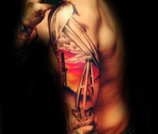 Half Sleeve Tattoo With Oilfield Design On Mans Arm