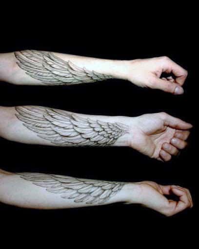 Wing tattoo extending from the wrist to the elbow