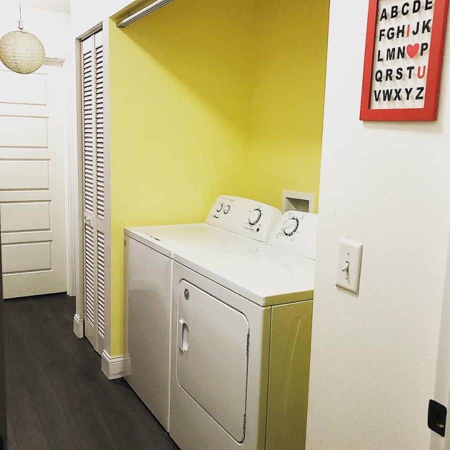 hallway laundry yellow accent wall 