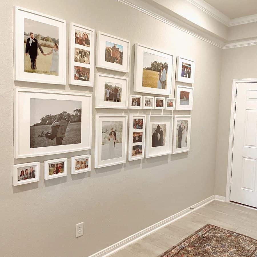 framed family photos in hallway