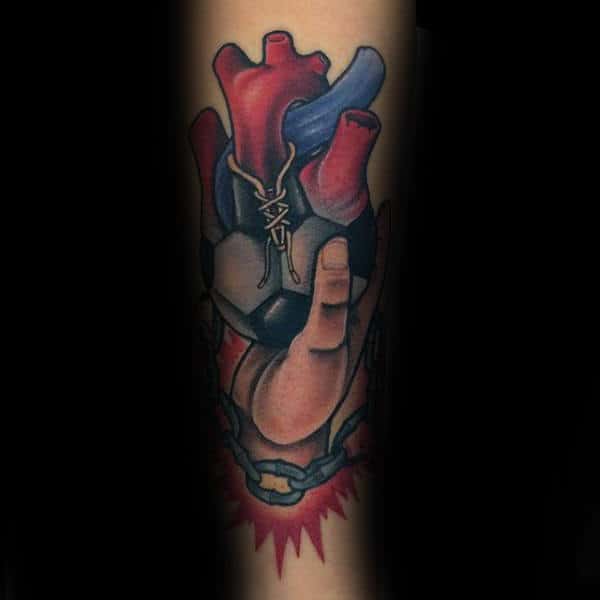 Hand Holding Heart With Soccerball Guys Forearm Tattoos