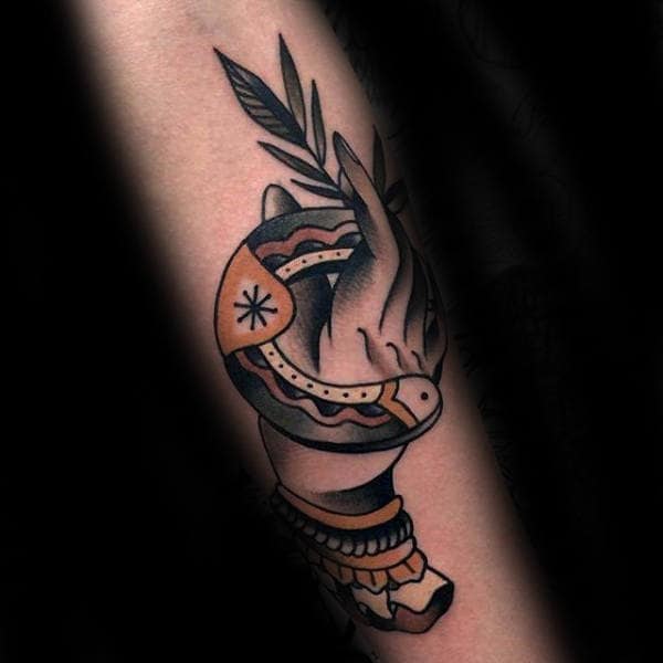 Hand Holding Horseshoe Traditional Guys Forearm Tattoos