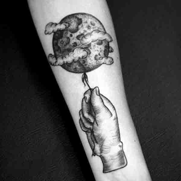 Hand Pulling Moon By A String Tattoo For Males On Forearm