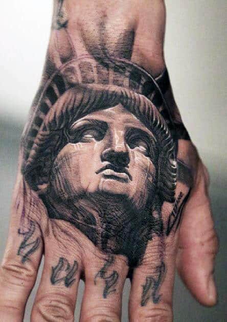 Hand Statue Of Liberty Tattoo For Men
