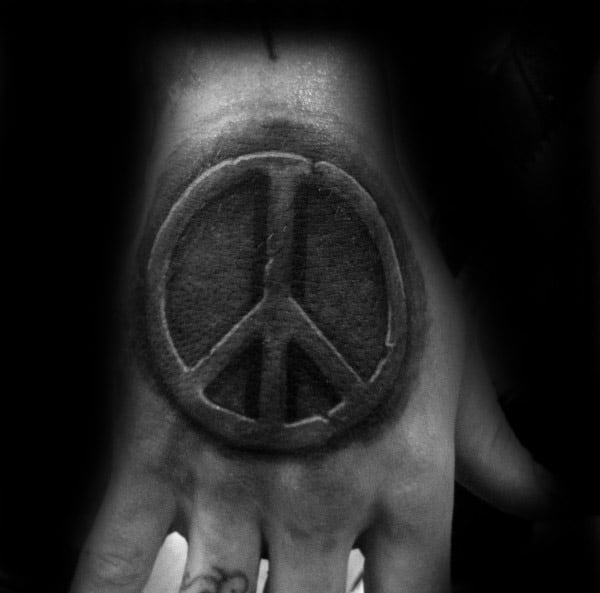 Hand Tattoo Of Stone Peace Sign For Men