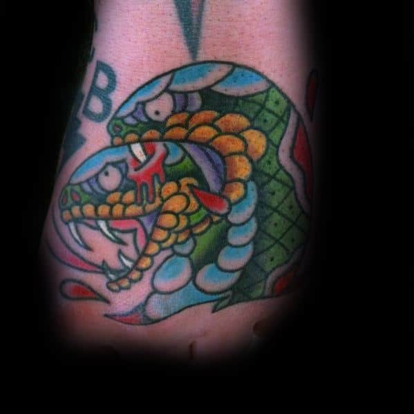 Vibrant two-headed snake tattoo in bold green, blue, and yellow tones, featuring fierce fangs and intricate details for a striking look.