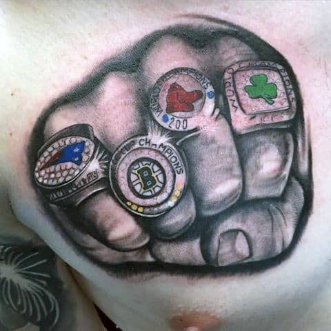 Hand With Championship Rings Guys New England Patriots Tattoo On Chest