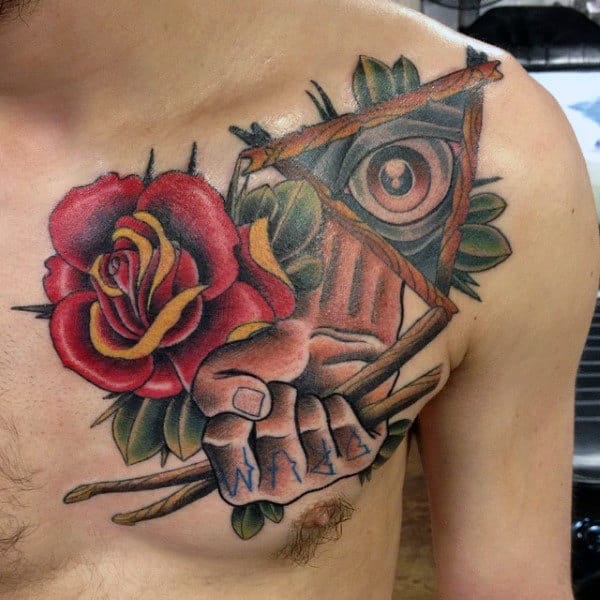 Hands Holding Drum Sticks With Rose Flower Male Upper Chest Tattoo
