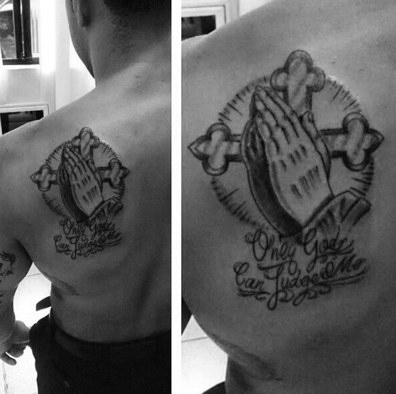 hands with cross and only god can judge me mens shoulder blade tattoo