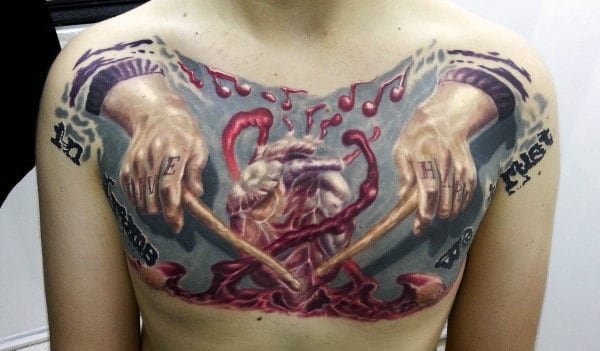Hands With Drum Sticks Playing Beating Heart Mens Upper Chest Tattoo