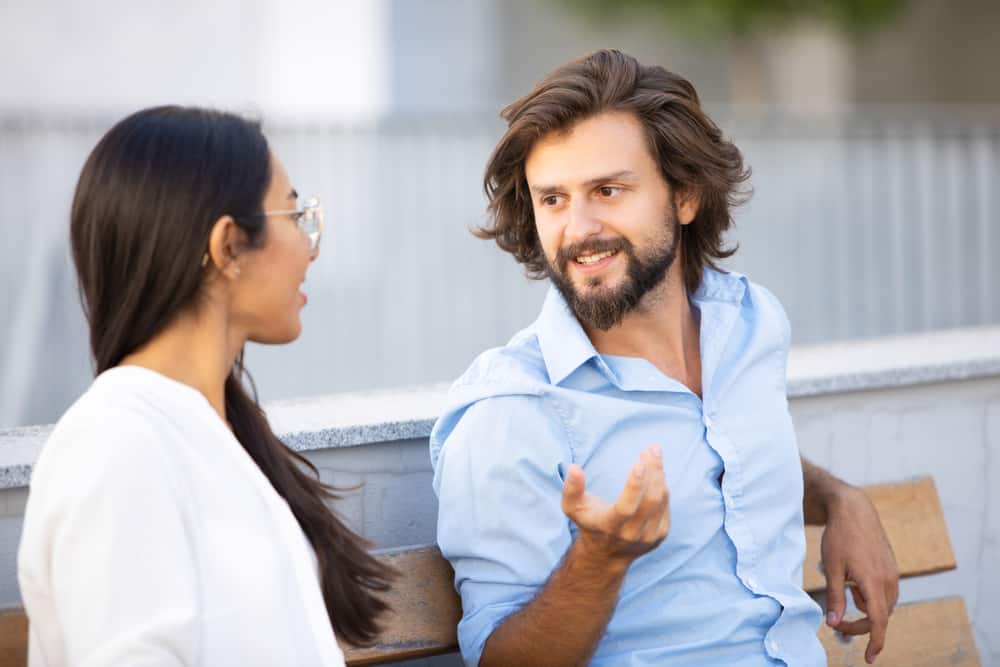 handsome man talking colleague