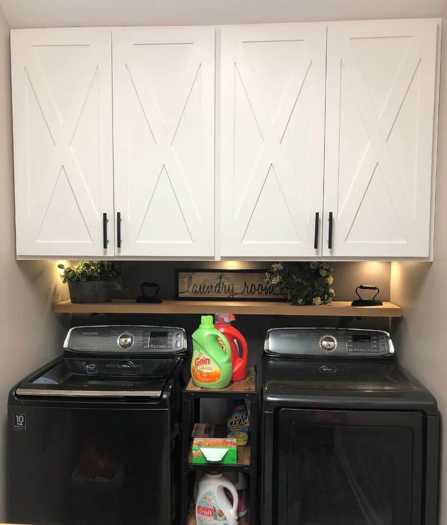 barn style wall cabinets washer and dryer laundry room