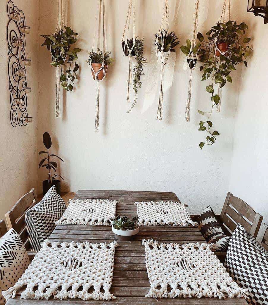hanging rope planter indoor garden wood table and chairs 