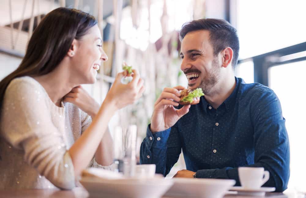 happy couple enjoying breakfast