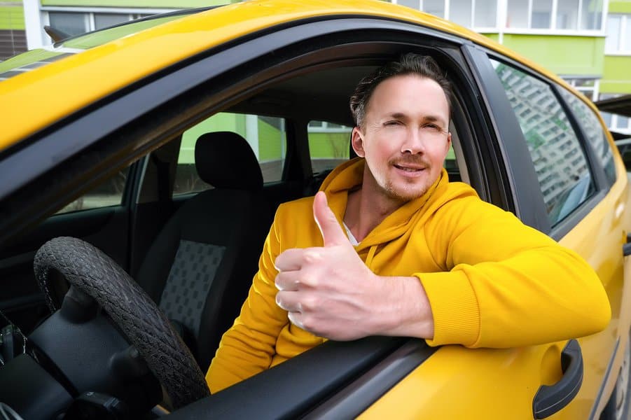 happy male taxi driver