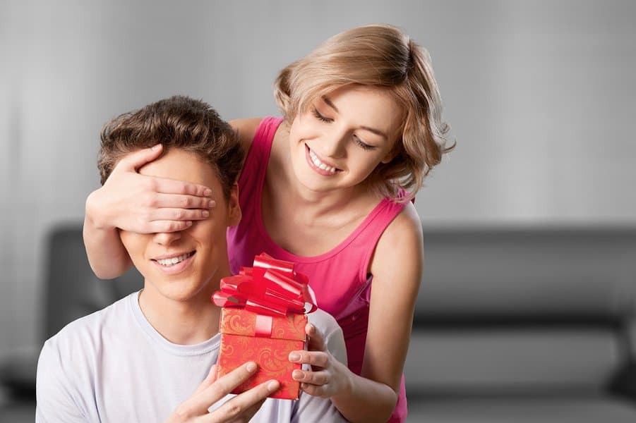 happy wife congratulates husband on birthday