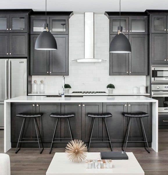 hardwood flooring wood kitchen black cabinets four stools pendant lights