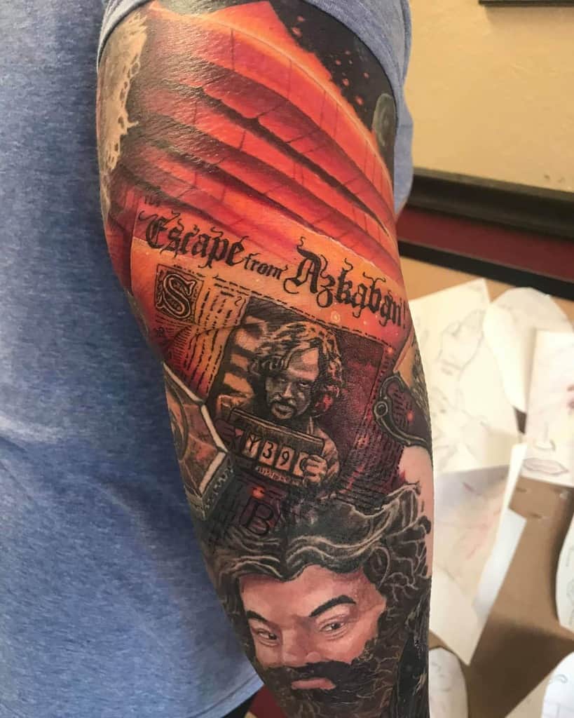 Detailed Harry Potter sleeve tattoo featuring Sirius Black’s 'Escape from Azkaban' mugshot, Hagrid, and fiery prison elements in a dramatic design