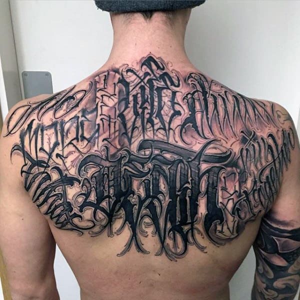 Haunting Black Lettering Tattoo Mens Back