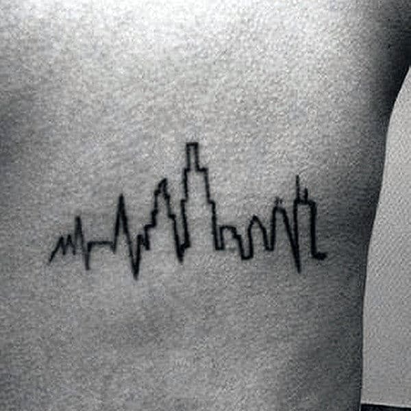 Heartbeat And Building Tattoo Mens Chest