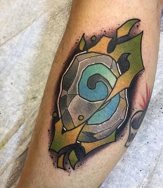 Colorful tattoo of a Hearthstone from World of Warcraft, featuring a glowing blue swirl, cracked stone texture, and vibrant magical aura, inked on the leg.