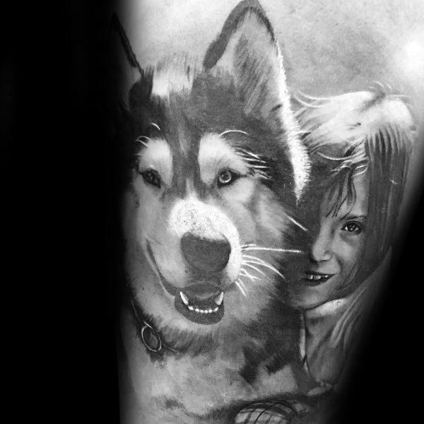 Hyper-realistic tattoo of a Siberian Husky and a smiling girl, featuring intricate shading and fine details for a lifelike and emotional design.